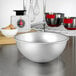 A Fat Daddio's hemisphere cake pan on a counter.