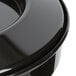 A black Carlisle polypropylene bowl with a lid on top.