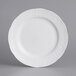 A close-up of a Tuxton Chicago bright white china plate with a design on it.