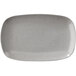 A white rectangular platter with speckled design.