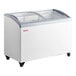 A white Galaxy curved top display freezer on wheels.