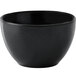 a black bowl with a white background