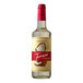 A Torani Puremade Coconut Flavoring Syrup 750 mL glass bottle with a label.