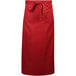 A close-up of a Mercer Culinary red bistro apron with a tie.
