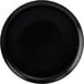 A black coupe plate with a white circle and dots in the center.