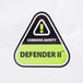 a green and black triangle with black text