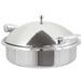 A stainless steel Vollrath Intrigue round chafer with lid.