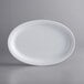 A white oval platter with a narrow rim.