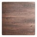 A square table top with a textured walnut finish.
