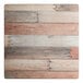A square table top with a textured mixed plank wood finish.