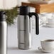 a silver and black thermos bottle