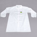 a white lab coat with a green patch