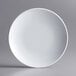 An Acopa Lunar white melamine plate with a small rim.