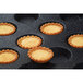 a tray of small pies