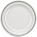 A Tuxton Green Bay ivory china plate with green bands.