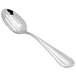 A close-up of a Fortessa stainless steel slotted serving spoon with a slotted handle.