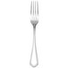 A Fortessa Medici stainless steel dinner fork with a white handle.