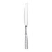 A silver Fortessa Lucca steak knife with a faceted handle.