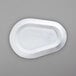 A close-up of a white oval Corona porcelain platter.