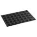 A black Sasa Demarle Flexipan Air silicone bread mold with 40 rectangular cavities.