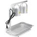 An Avantco silver stainless steel countertop heat lamp with two red bulbs over a tray.