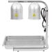 An Avantco silver countertop food warmer with two heat lamps above a stainless steel tray and grid.