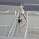 An Avantco flat top display ice cream freezer with a key attached to the glass door.