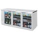 A white Beverage-Air back bar refrigerator with glass doors filled with bottles of beer.