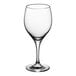 A close-up of a clear Schott Zwiesel wine glass with a short stem.