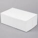 A white bakery box on a gray surface.