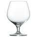 A clear glass brandy snifter with a stem.