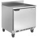 A Beverage-Air stainless steel worktop freezer on wheels with a door.