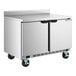 A stainless steel dual temperature worktop refrigerator and freezer with two doors and caster wheels.