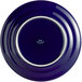 A cobalt blue Tuxton Concentrix china plate with a white rim.