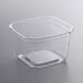 A clear Fabri-Kal square plastic deli container with a square lid.