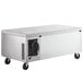 A stainless steel Beverage-Air chef base with wheels.