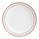 A white plastic plate with two rose gold or copper bands around the rim.