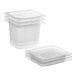 A stack of three San Jamar translucent plastic food pans with lids.