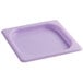 A purple San Jamar ModPan 1/6 size plastic lid on a white counter.