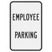 A white rectangular sign with black text that reads "Employee Parking" and has a black border.