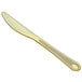 A Visions gold plastic knife with a satin handle.