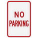 A white rectangular aluminum sign with red text that says "No Parking" in diamond grade reflective material.
