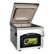 An ARY VacMaster VP220 tabletop vacuum packaging machine with a lid open.