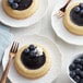 A group of desserts with Les Vergers Boiron blueberry puree, blueberries, and whipped cream.