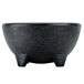 A black polypropylene molcajete bowl with legs.