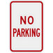 A white sign with red text that says "No Parking"