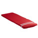 A red chaise cushion with white stripes.