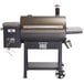 A Backyard Pro wood-fired pellet grill with the lid open.