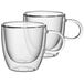 Two clear Villeroy & Boch glass cups with handles.