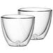Two clear Villeroy & Boch double wall glass cups on a white background.